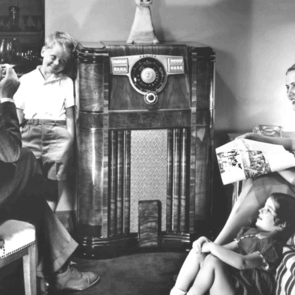 A family gathered around a Zenith console radio, 1930s